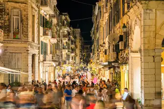 Join the bustle of the night scene in Corfu's Old Town