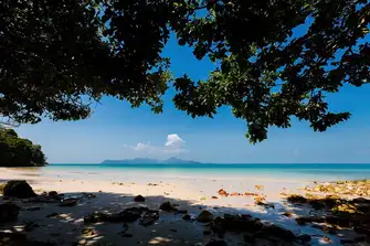 Pantai Cenang Beach, on the south west coast of Langkawi island, overlooks the sea that brought ashore so many of its culinary influences