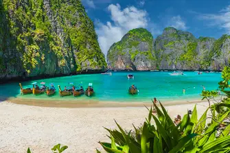South East Asia is both culturally surprising and quite breathtakingly beautiful, as we see here in the famous Maya Bay in Thailand's Mu Ko Phi Phi National Park