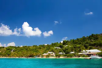 Manchioneel Bay is home to the Cooper Island Beach Club with bars, dining and boutiques