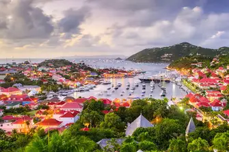 Dozens of yachts in Gustavia's port and hundreds anchored off, St Barth is where the south of France meets the Caribbean