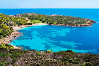 Find hidden beaches and bright waters at Asinara Island off Sardinia