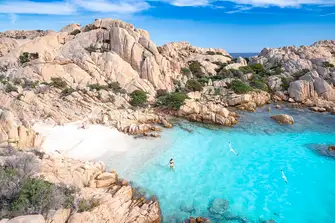 The smooth granite, white sands and turquoise waters of the Maddalena Archipelago off the north east coast of Sardinia are a yachting paradise