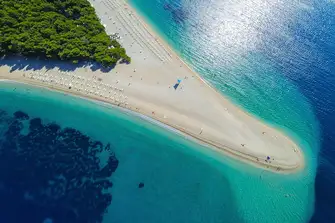 Zlatni Rat, on the island of Brac, may be one of the few sandy beaches in Croatia, but what an example