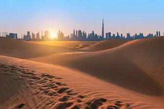 Dubai stands where the desert meets the sea