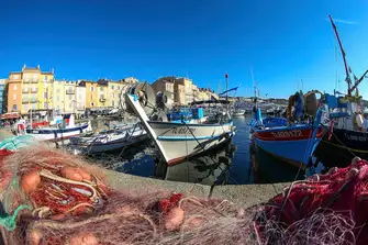 Stroll around the Vieux Port to enjoy the pastel shades, cafes, boutiques, restaurants and bars