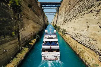 The 6.4km (4 mile) Corinth Canal links the Aegean and Ionian Seas, saving a journey around the Peloponnese peninsula