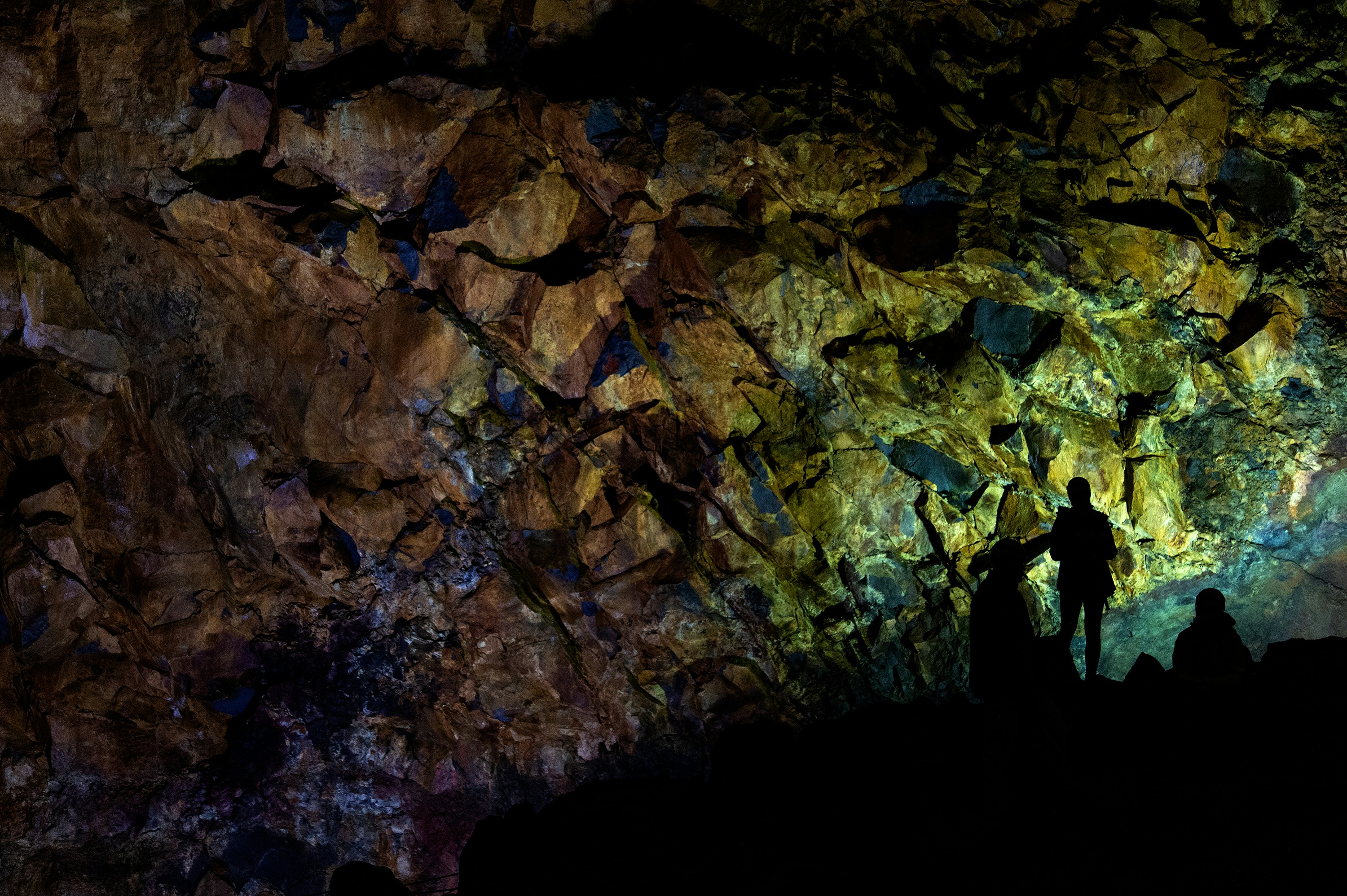 Silhouette of person inside the volcanic chamber