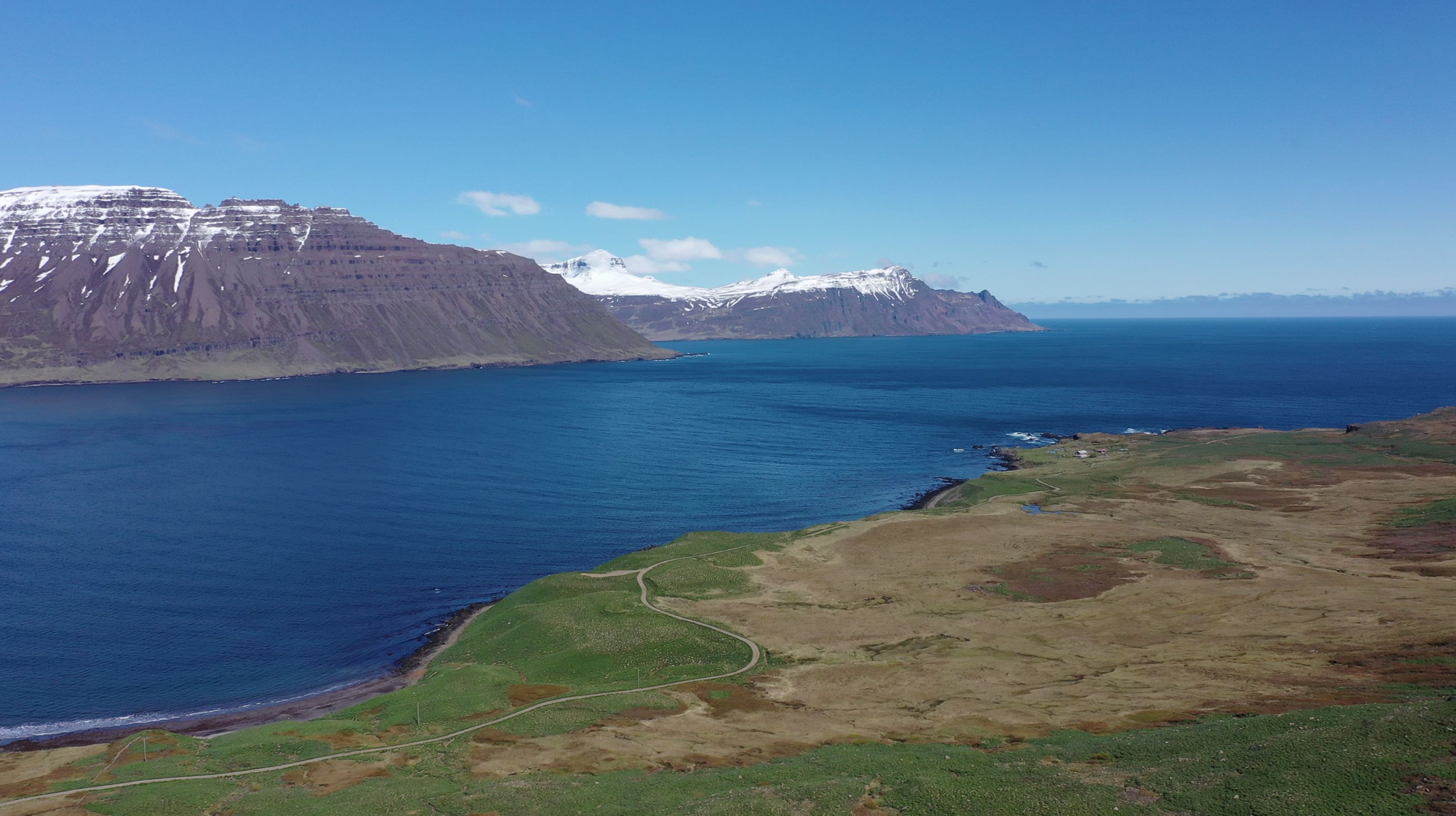 The rugged coastline and snow-capped mountains of the Westfjords