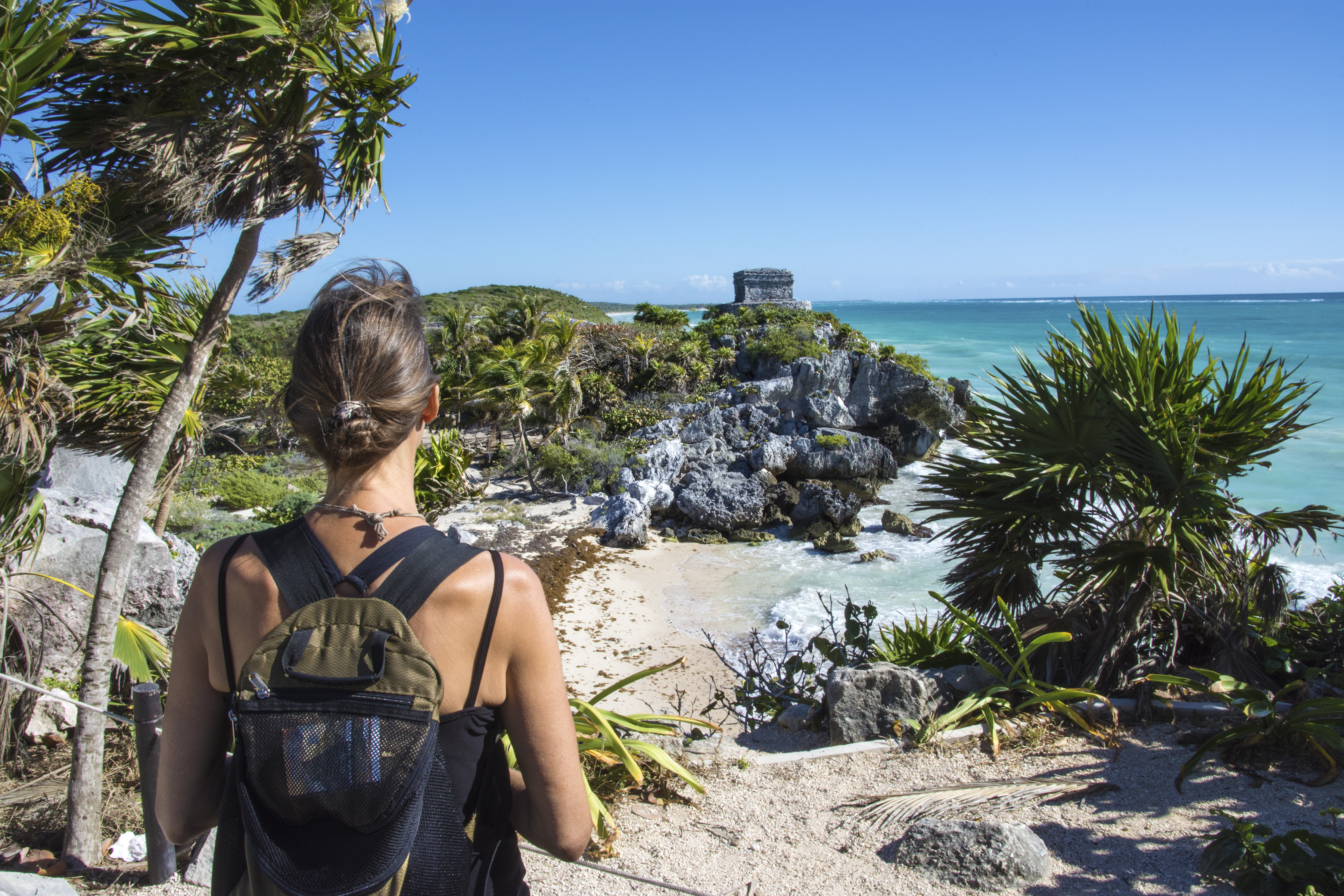 A woman looking at a beach