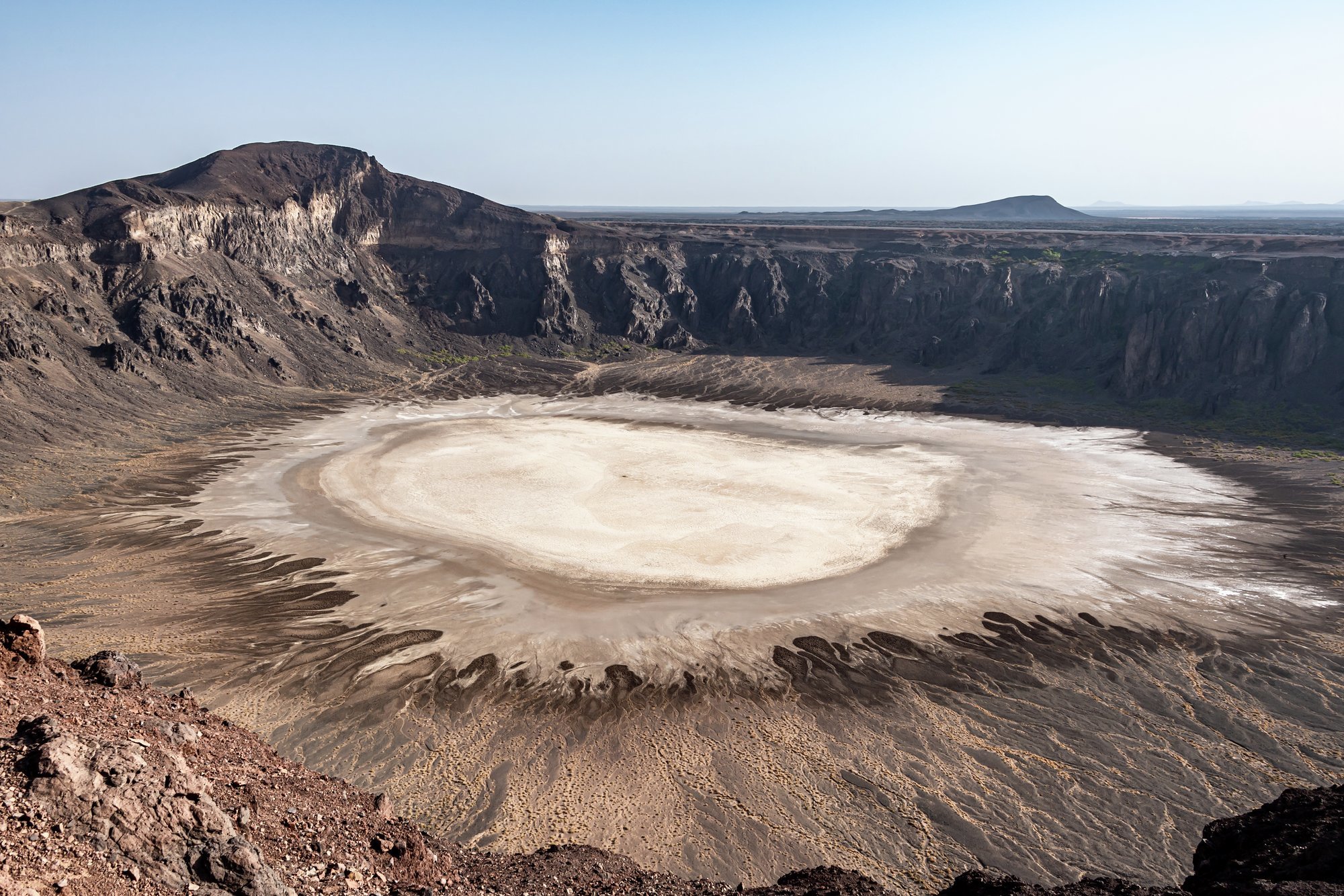 Visit the Al Wahbah Crater in the lava fields of Harrat Kishb