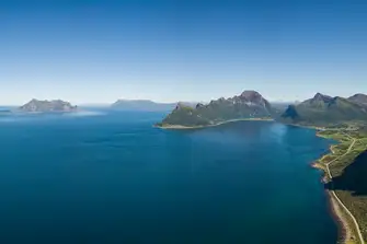 On board a yacht, keen climbers can scale the Lofoten Wall from shore to summit with an expert guide