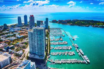 The Miami Beach Marina location is right next to our Miami office, at the base of the tower in the foreground