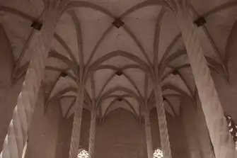 Twisted columns support a vaulted ceiling inside the Llotja de Palma 