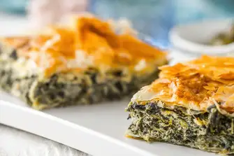 Indulge in the local cuisine and experience the delightful aroma and flavour of the well known Greek snack Spanakopita