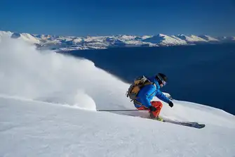 The skiing in Lyngen Fjord is exquisite - sand in summer there's 24-hour daylight