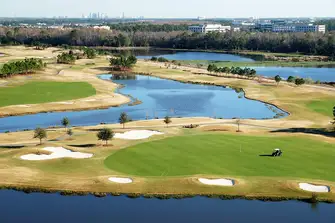 Mix golf with bass fishing at a course that has Orlando shimmering in the background