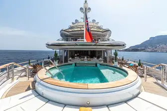 The pool, sun, shade, bar, TVs and lounges make the main deck aft a great place to spend time