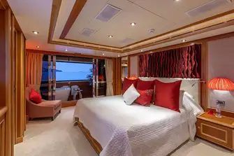 The owner's suite forward on the main deck has a free-standing bathtub on the private balcony to starboard