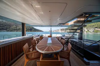The bridge deck has a generously sized open-air dining table with a lounge aft where guests can take a digestif after dinner