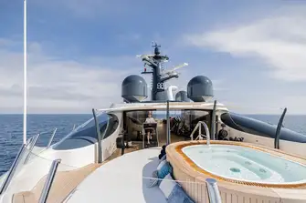 The forward sun deck has a raised jacuzzi encircled by sunpads and gym equipment inside and out