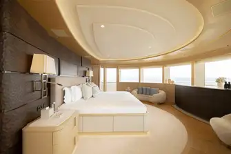 The bedroom suite on the owner's deck has wraparound views and access to the sidedecks