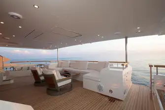 A shaded lounge on the main deck aft