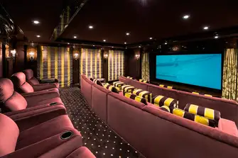 Enjoy a theatrical experience in the yacht's main deck cinema