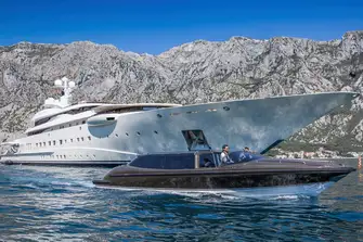 The yacht's Vikal tenders are stowed behind shell doors on the main deck aft
