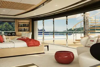 The owner's suite looks aft through full-height glass across the private terrace