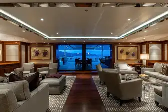 The upper deck sky lounge opens onto a large aft deck entertaining space