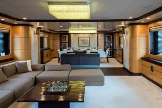 The main saloon has a sit-up bar aft, lounge seating and dining forward