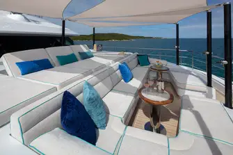 The foredeck's sunpads and lounge seating