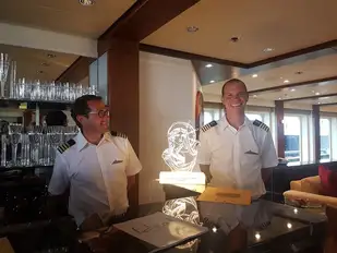 SLIPSTREAM's Captains Phil (left) and Steve with the 2018 Yachts du Coeur award