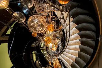 TALISMAN C - The spectacular glass artwork around which the stairs spiral