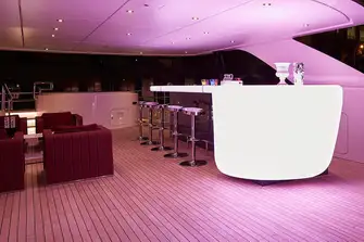 A showpiece bar, lounge and jacuzzi looking aft on the sun deck