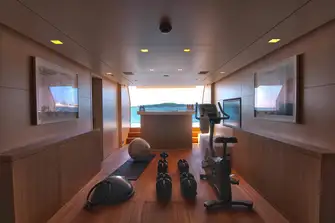 With the stern door open, SIREN's gym looks out over the sea