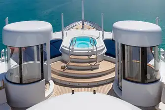 The shower, jacuzzi and elevator on the forward sun deck