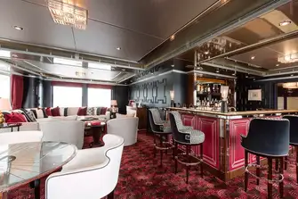 The Lalique bar in the sky lounge can transform into a Parisian nightclub