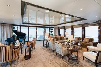 The main saloon features floor-to-ceiling windows to create a light-filled lounge