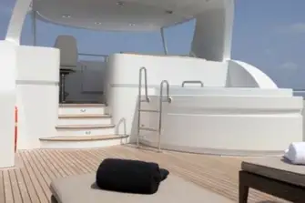 An observation lounge and flybridge forward and a jacuzzi at the foot of the steps