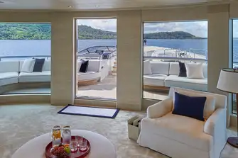 Full-height windows in the owner's suite and direct access to the foredeck helipad