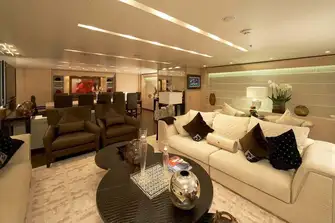 The main saloon with a lounge set to port and formal dining forward