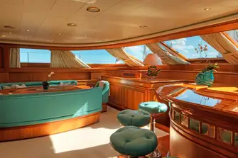 Formal dining to port and a sit-up bar to starboard, both with great views