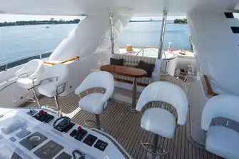 The flybridge forward on the sun deck with the jacuzzi aft