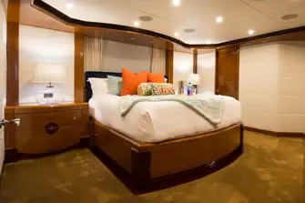 Forward on the main deck is a spacious owner’s suite...