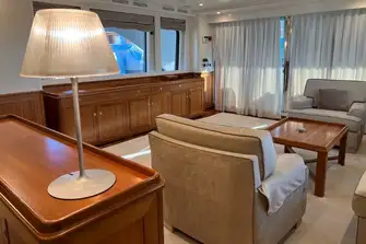 The bright and airy saloon, with its spacious, restful design by Alessandra Negrato, is aft of the formal dining area