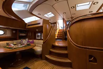 The lower saloon has great natural light, dining to starboard and a TV to port
