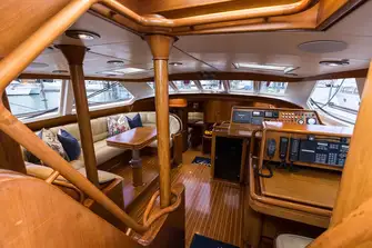 The deck saloon has dining to port and nav station and chart table to starboard, with great all-round views