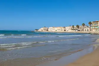 Sampieri is a quiet town on Sicily's southern coast with a glorious stretch of sand